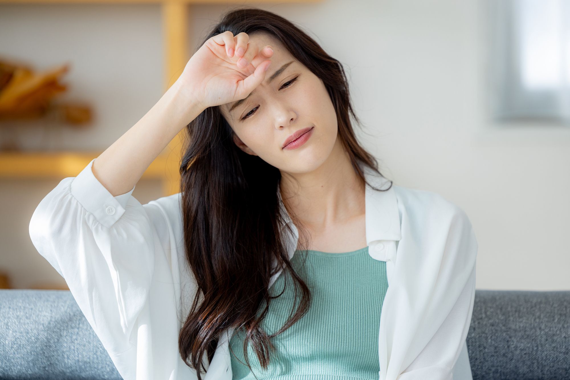 貧血で具合の悪い女性